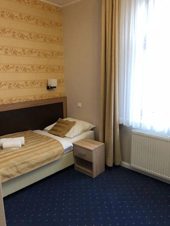 Postel nebo postele na pokoji v ubytování Villa Zagórze