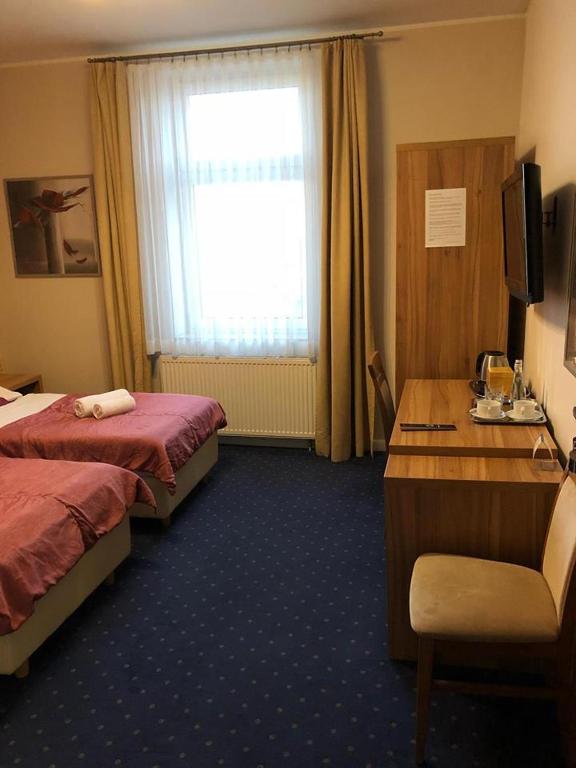 Postel nebo postele na pokoji v ubytování Villa Zagórze