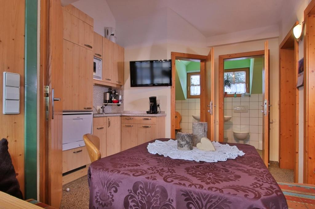 Kuchyň nebo kuchyňský kout v ubytování Gästehaus Berger