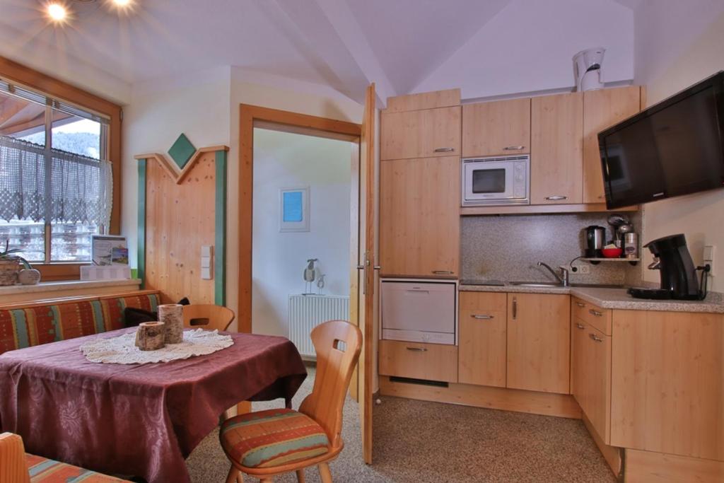 Kuchyň nebo kuchyňský kout v ubytování Gästehaus Berger