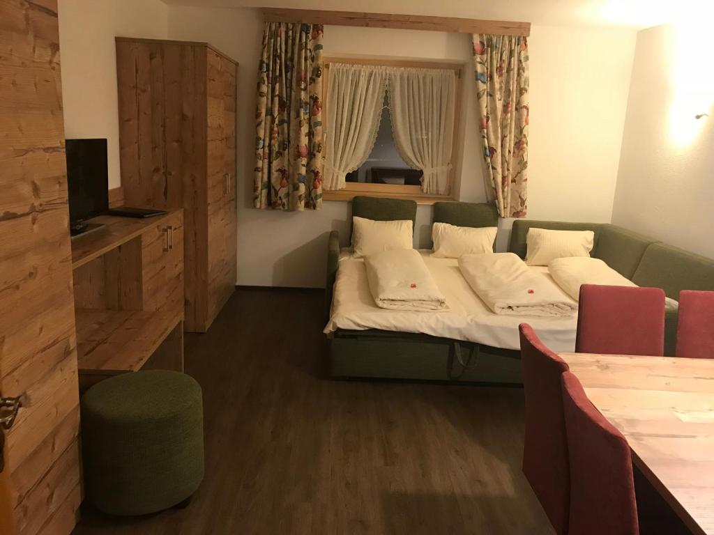 Postel nebo postele na pokoji v ubytování Ferienhaus Larinmos