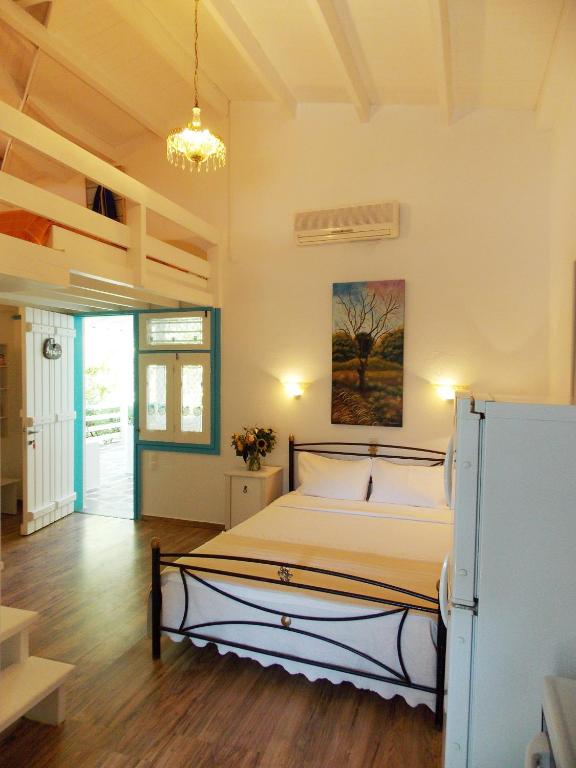 Postel nebo postele na pokoji v ubytování Skiathos Driades