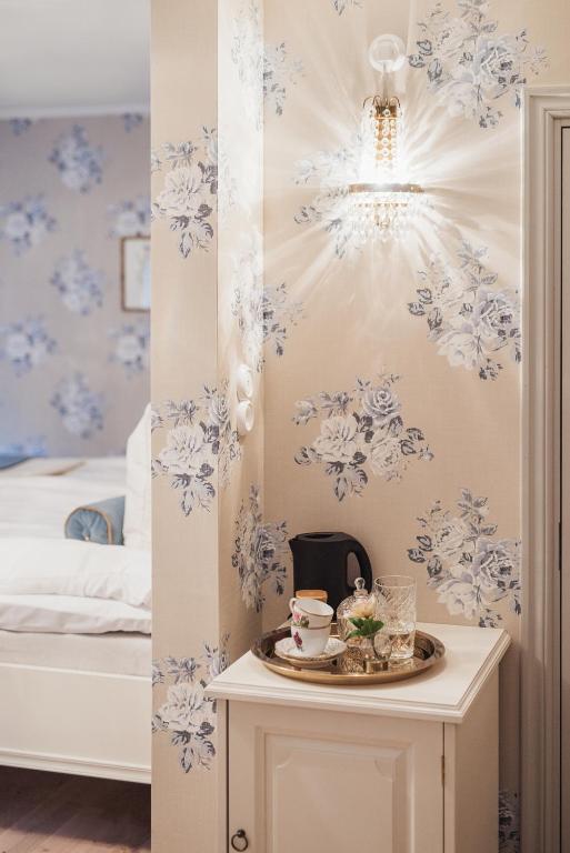 Postel nebo postele na pokoji v ubytování Hilma Winblads Bed & Breakfast