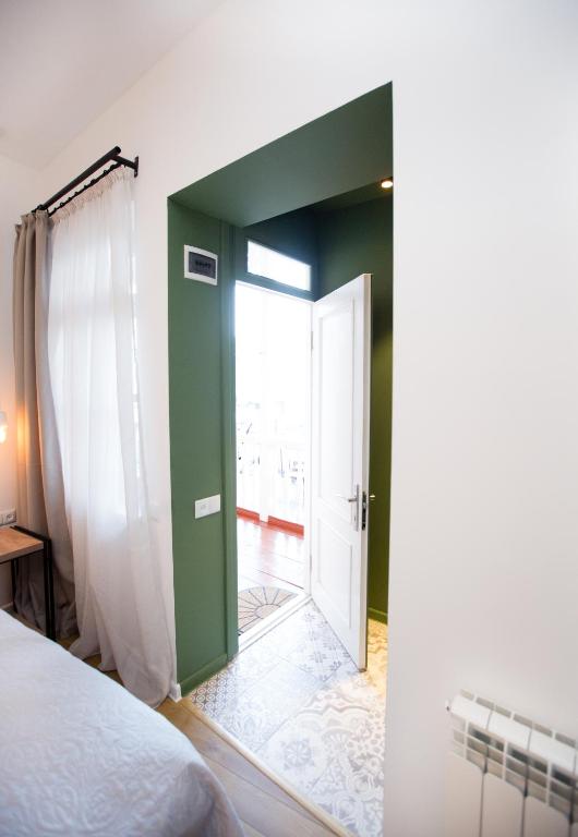 Postel nebo postele na pokoji v ubytování Meidan Suites