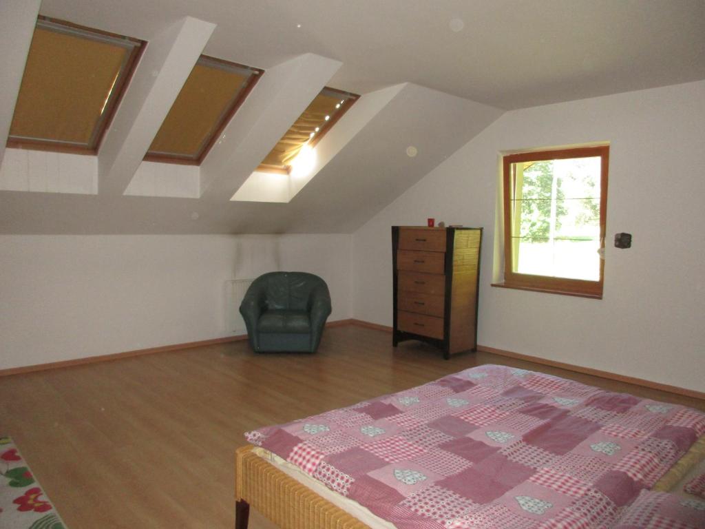 A bed or beds in a room at Villa Cechy