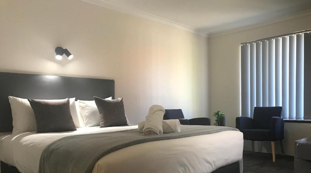 Postel nebo postele na pokoji v ubytování Hotel Clipper