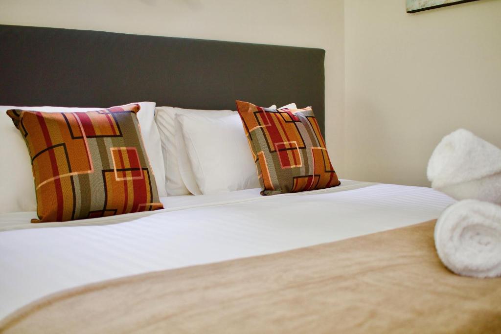 Postel nebo postele na pokoji v ubytování Hotel Clipper