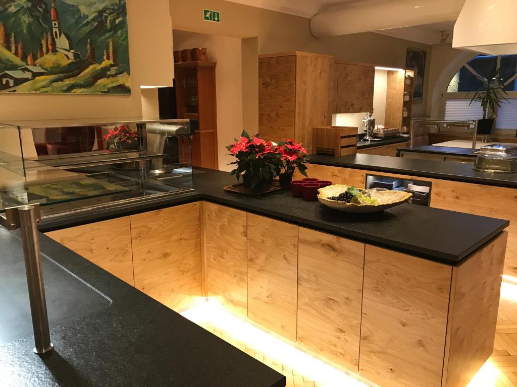 Kuchyň nebo kuchyňský kout v ubytování Aktiv Hotel Zur Rose am Brenner