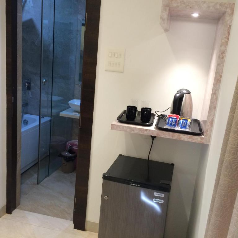 Kuchyň nebo kuchyňský kout v ubytování Hotel Rezo's