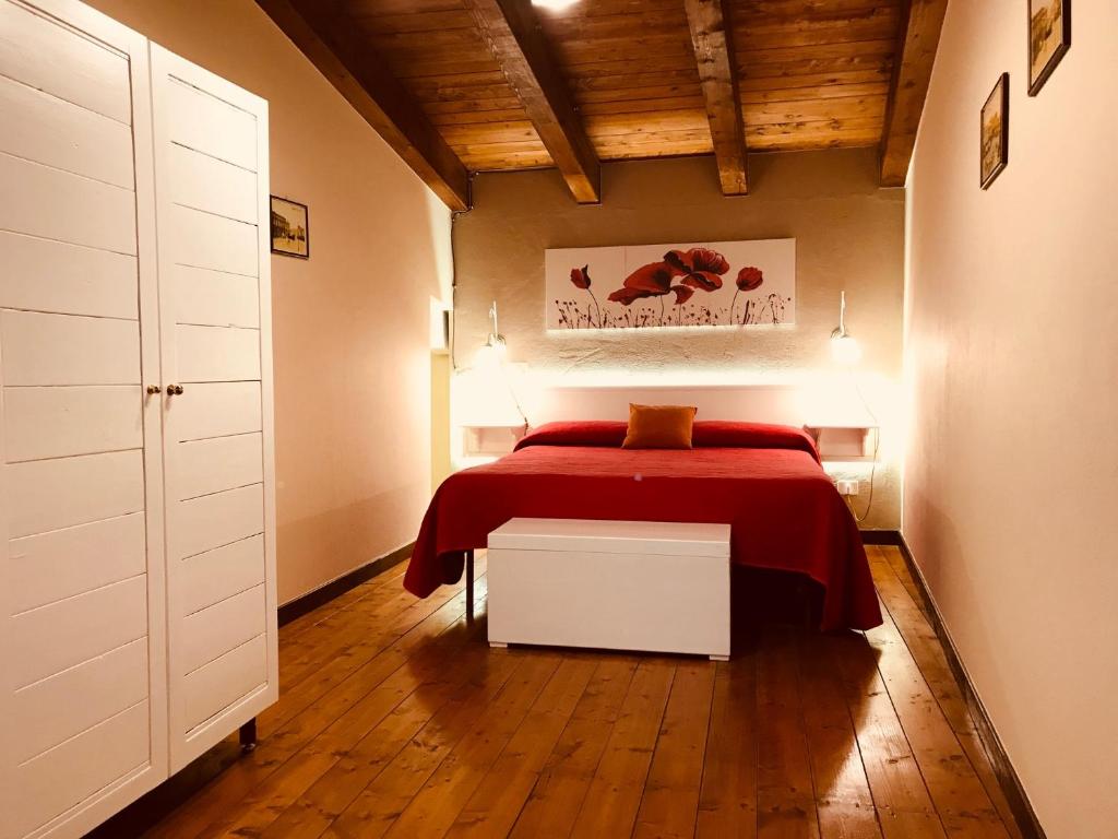 Postel nebo postele na pokoji v ubytování Albergo Tripoli B&B Affittacamere