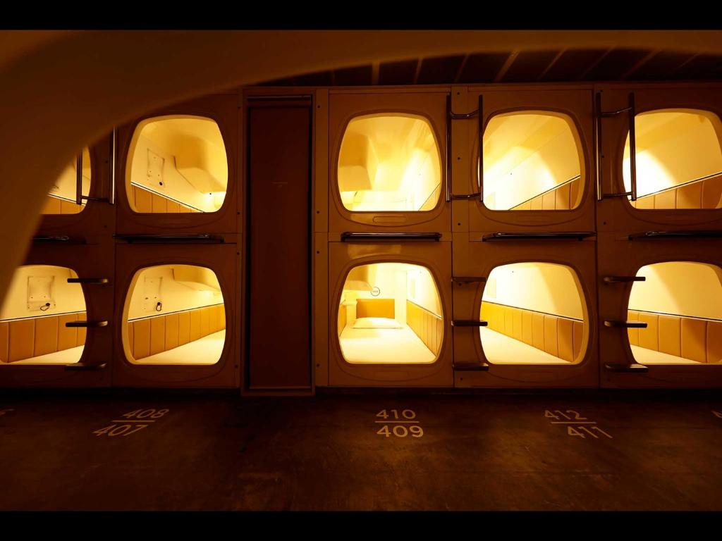 a room with many windows with lights in it at Do-c Shibuya Ebisu in Tokyo