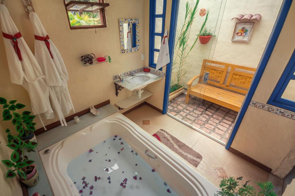 Um banheiro em Pousada Villa Lagoa das Cores