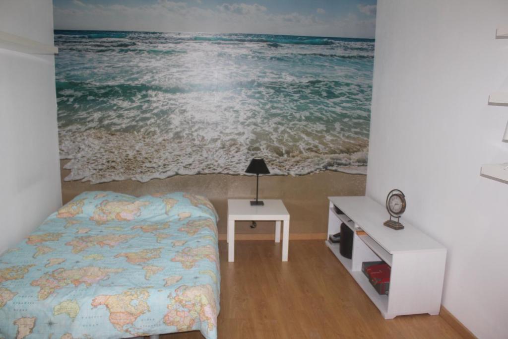 Postel nebo postele na pokoji v ubytování Green Wave Hostel