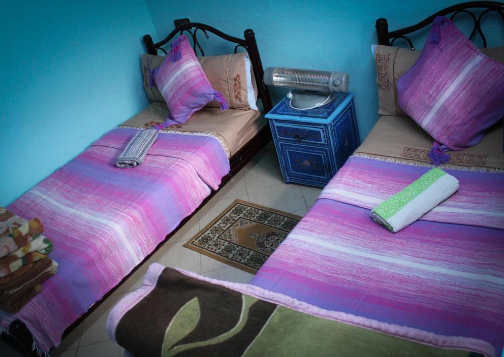 Letto o letti in una camera di Hotel Souika