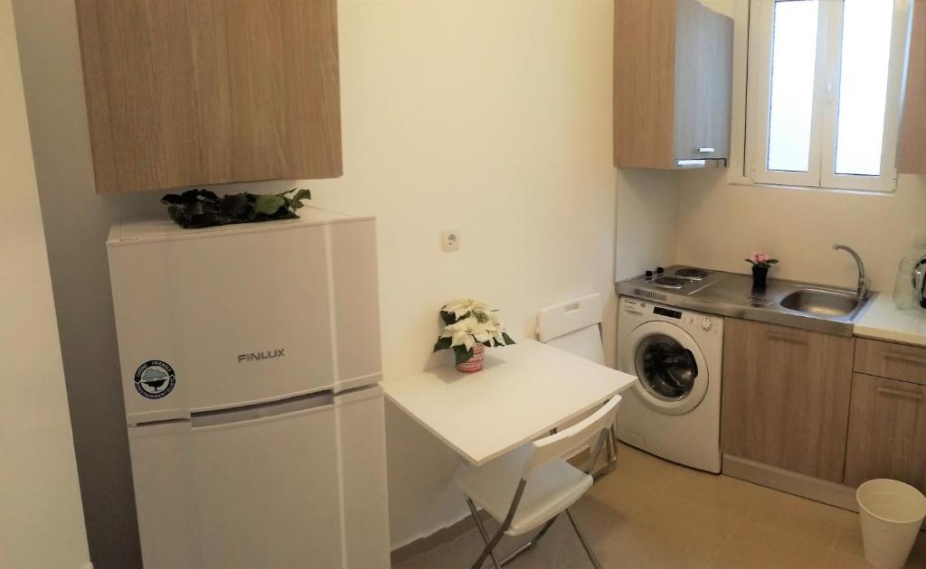 Kuchyňa alebo kuchynka v ubytovaní Nafplion Smart Apartment