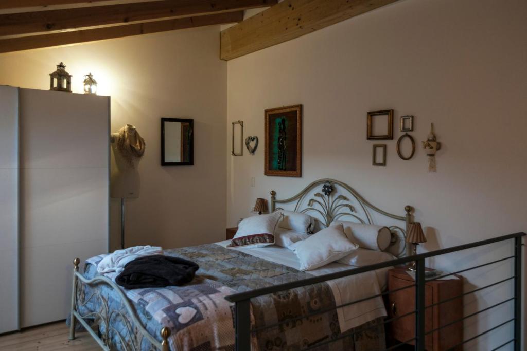 Postel nebo postele na pokoji v ubytování Casa Del Sole