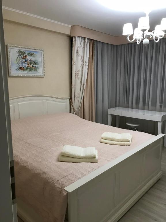Postel nebo postele na pokoji v ubytování Panorama Apartment 46-C, DONOVALY,976 39 SLOVAKIA