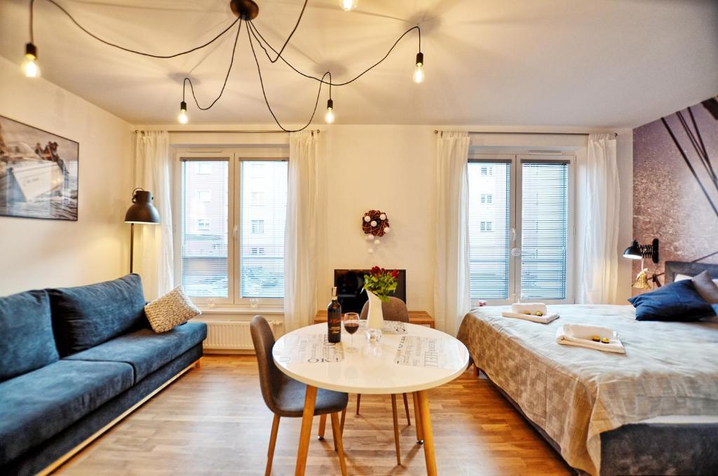 Posteľ alebo postele v izbe v ubytovaní Tartaczna Deluxe Apartments Gdansk