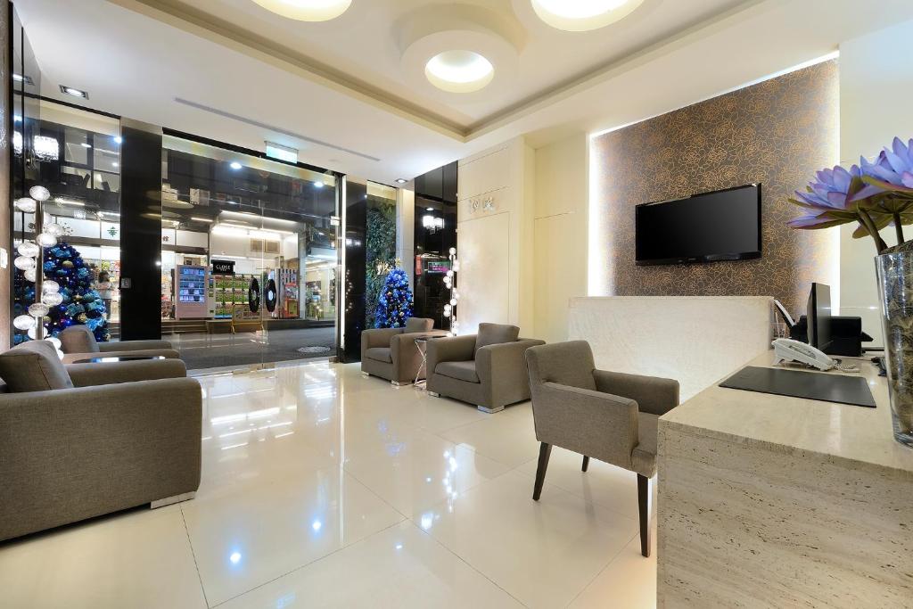 Télévision ou salle de divertissement dans l'établissement Hu Yue Lakeview Hotel