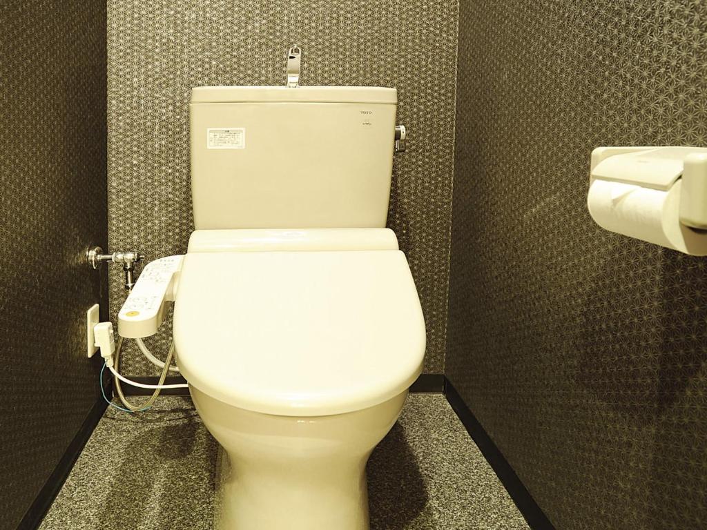 Koupelna v ubytování Satomo Ryokan