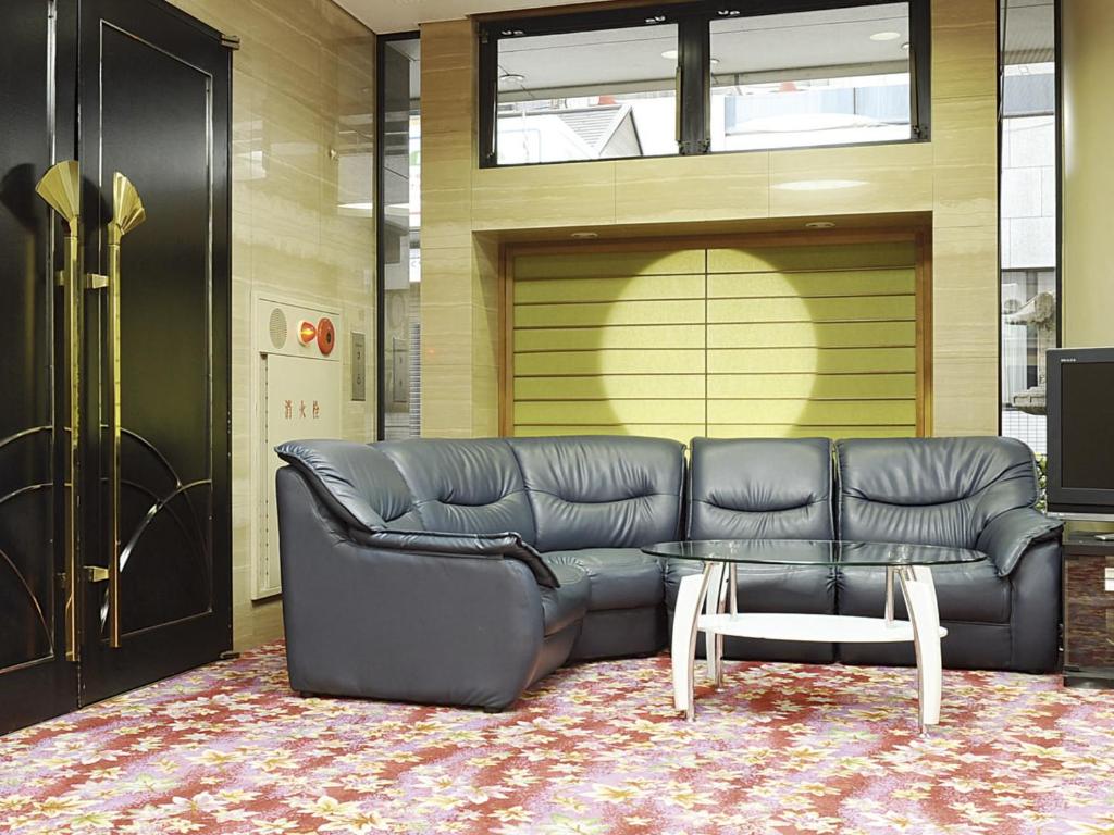 Posezení v ubytování Satomo Ryokan