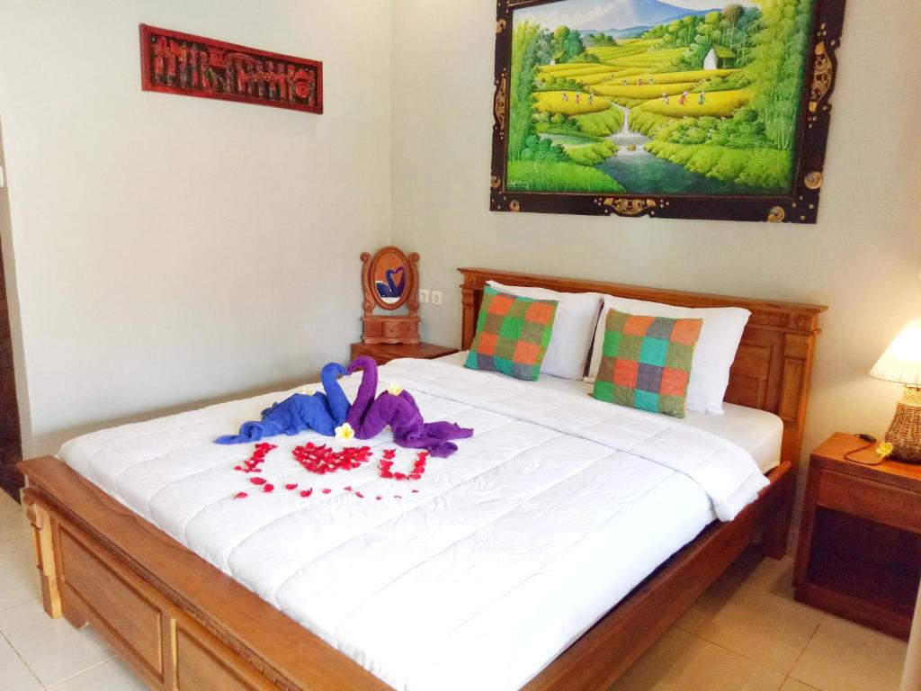 Postel nebo postele na pokoji v ubytování Geriya House