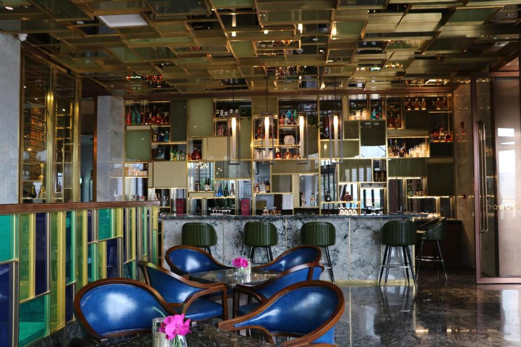 Lounge nebo bar v ubytování Rongjiang Hotel