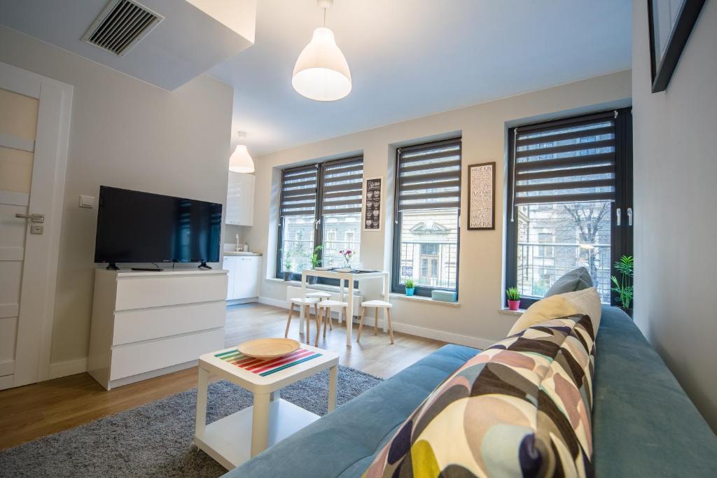 TV a/nebo společenská místnost v ubytování Kazimierz Friendhouse Apartments