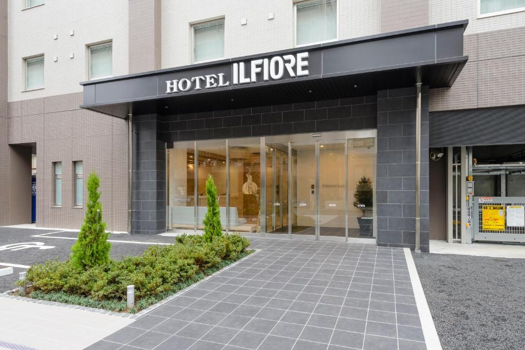 a store front of a building with at Hotel Il Fiore Kasai in Tokyo