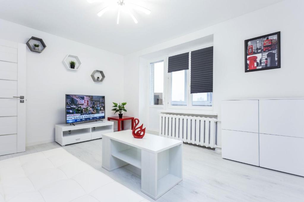Televízia a/alebo spoločenská miestnosť v ubytovaní Apartment Roomer 10