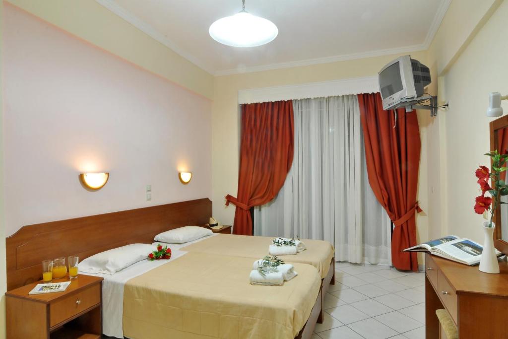 Postel nebo postele na pokoji v ubytování Lido Sofia Holidays