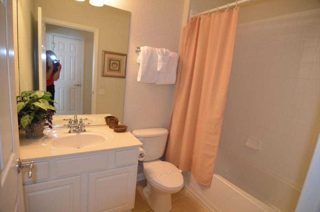 A bathroom at Amazing House! - Windsor Hills - 7783TB