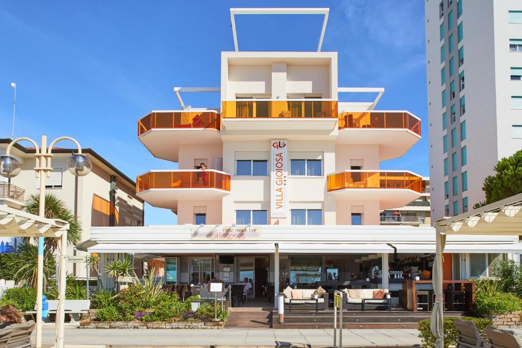 a building with a round balcony on top of it at Hotel Villa Gioiosa in Lido di Jesolo