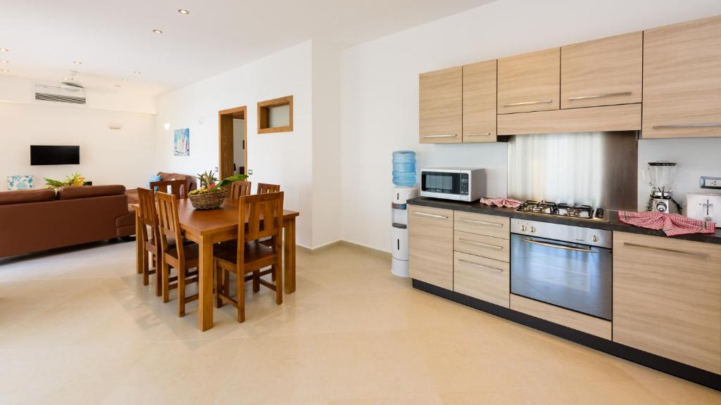 Kuchyň nebo kuchyňský kout v ubytování Aligio Apart-hotel & Spa - Las Terrenas