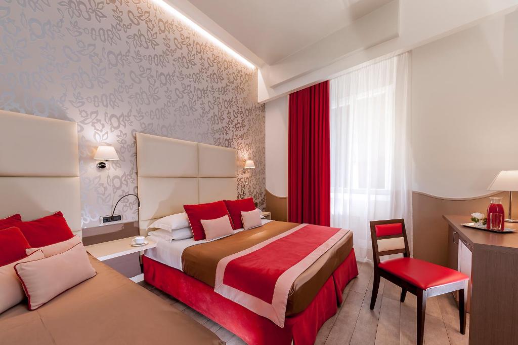 Postel nebo postele na pokoji v ubytování Demetra Hotel