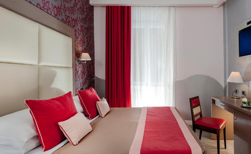 Postel nebo postele na pokoji v ubytování Demetra Hotel