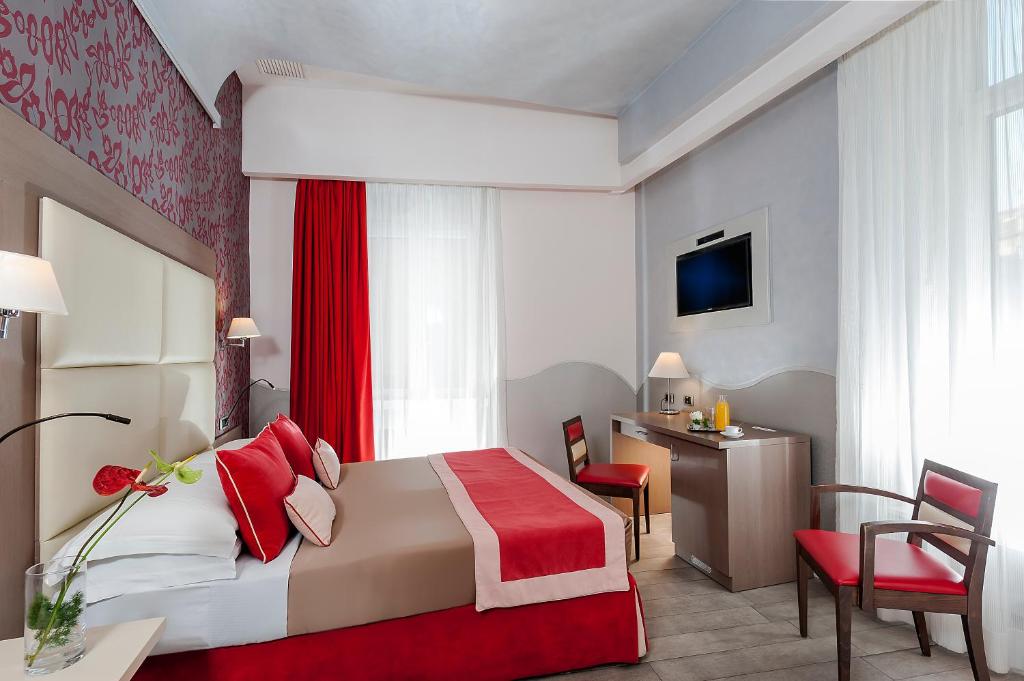 TV a/nebo společenská místnost v ubytování Demetra Hotel