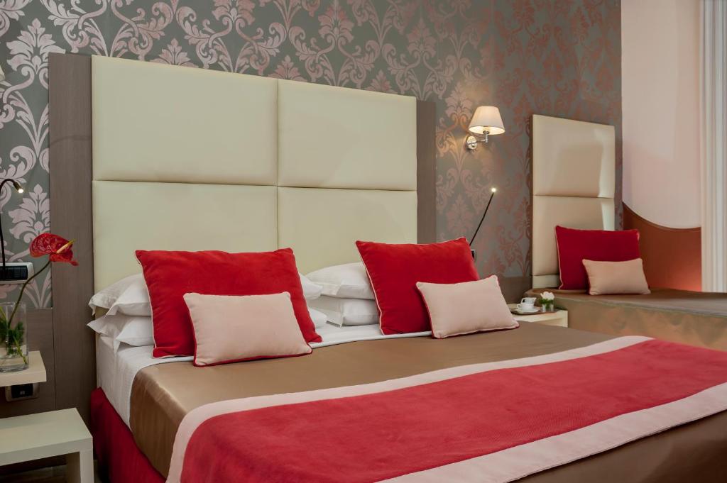 Postel nebo postele na pokoji v ubytování Demetra Hotel