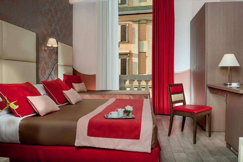 Postel nebo postele na pokoji v ubytování Demetra Hotel