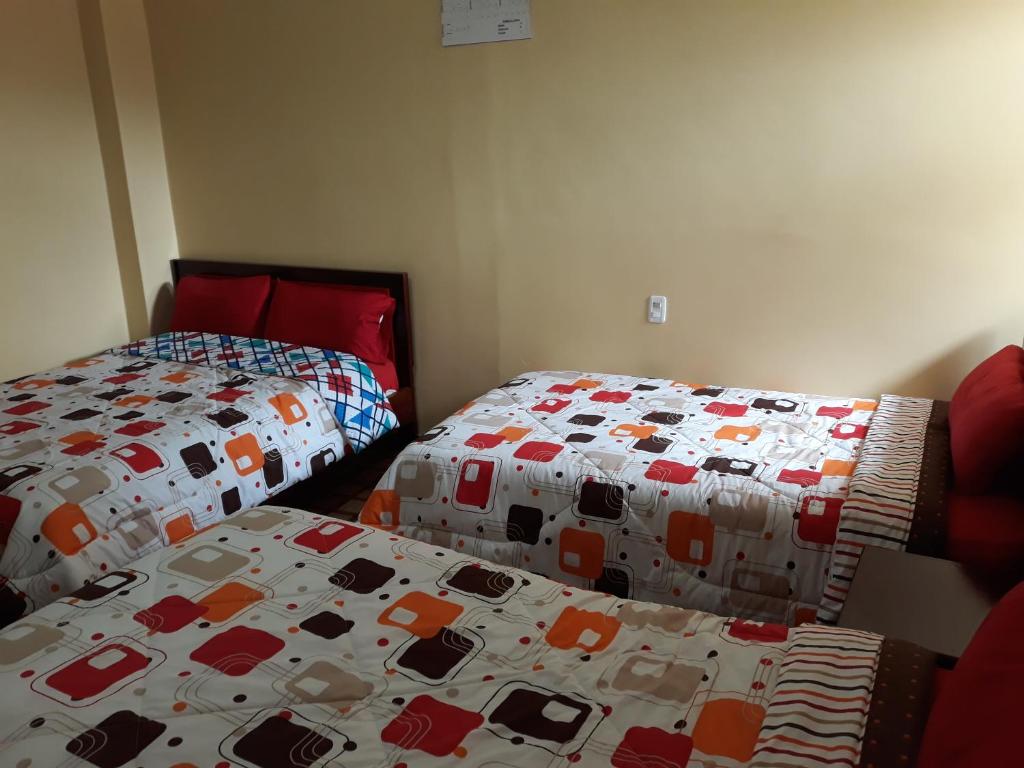 Postel nebo postele na pokoji v ubytování Hotel Navarra
