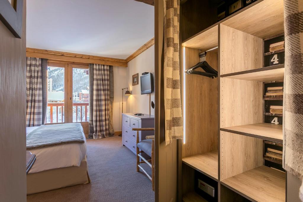 Postel nebo postele na pokoji v ubytování Hotel Kandahar
