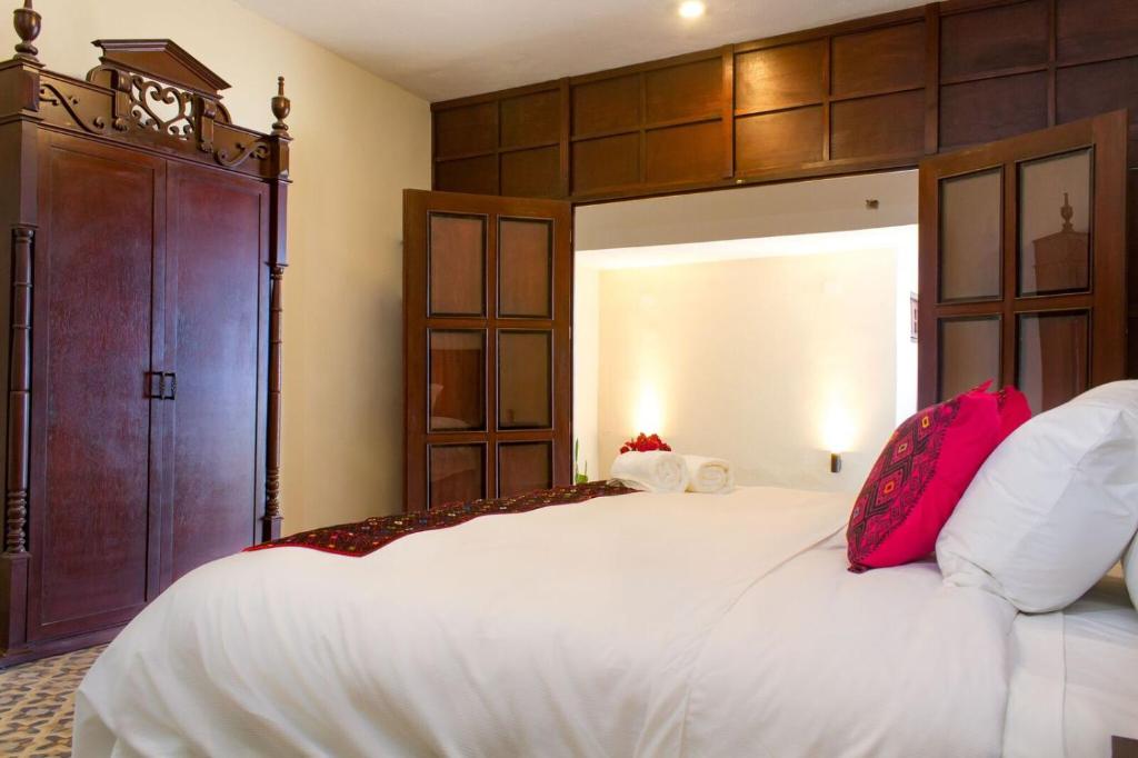 Postel nebo postele na pokoji v ubytování Hotel Maculís