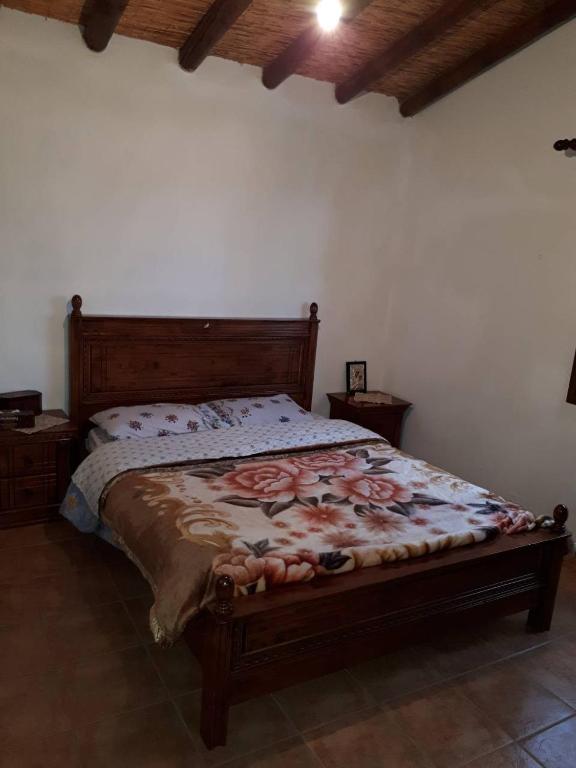 Postel nebo postele na pokoji v ubytování Agrompelo House