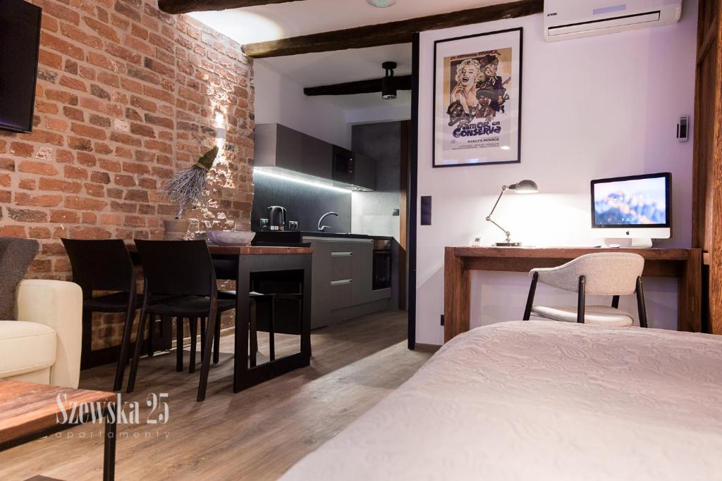 Kuchyňa alebo kuchynka v ubytovaní Apartamenty Szewska 25