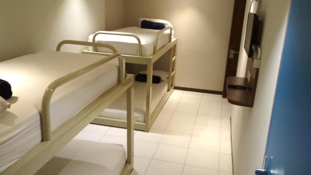 Postel nebo postele na pokoji v ubytování Subwow Hostel