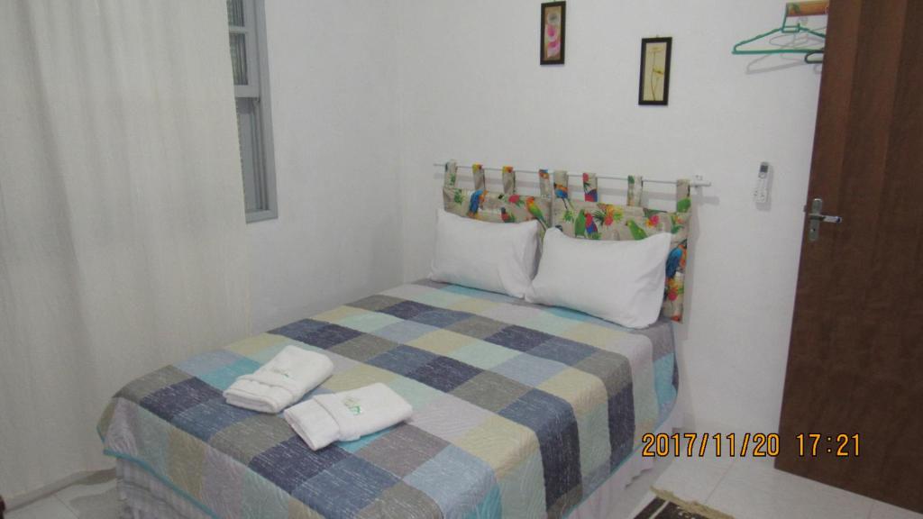 Postel nebo postele na pokoji v ubytování Hotel Pousada Girassol