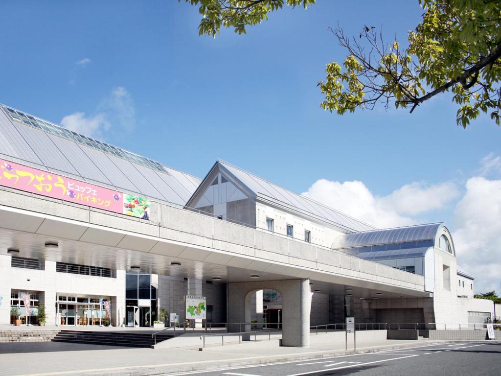 a rendering of the front of a building at Kibi Kogen Resort Hotel in Kaga