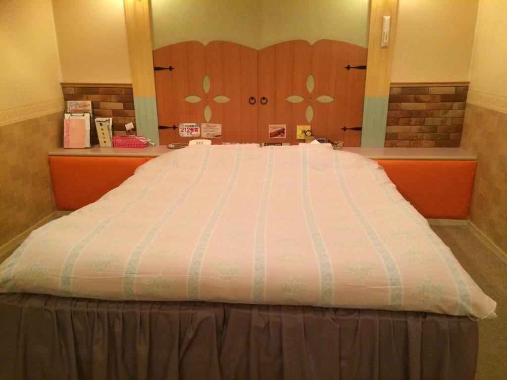A bed or beds in a room at Fukui Aine (Adult Only)