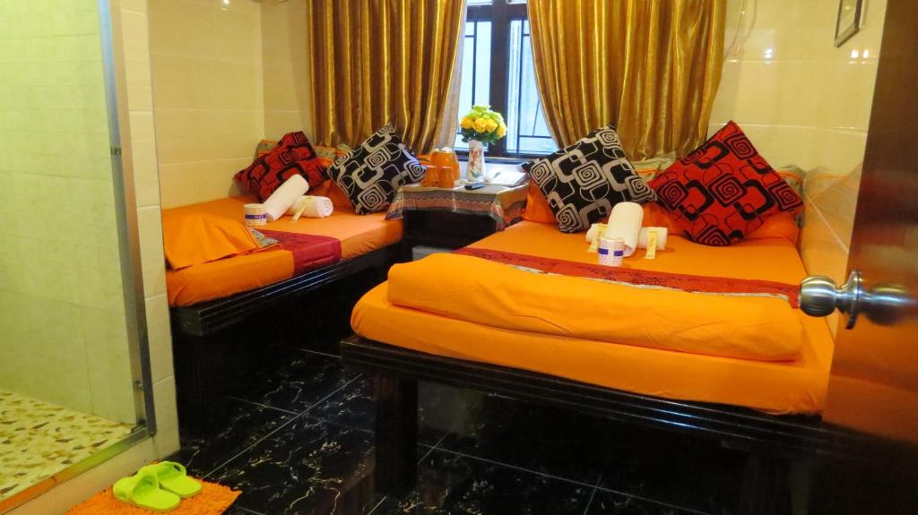 Rúm í herbergi á Paris Guest House (D2, 10/F)