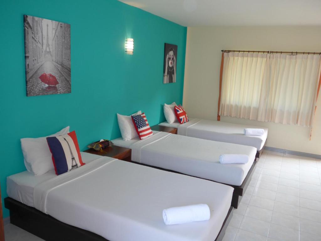Postel nebo postele na pokoji v ubytování Forum House Hotel Krabi